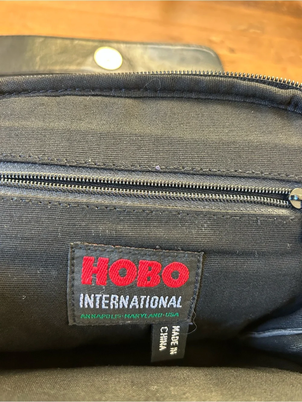 HOBO Black Canvas Crossbody International with Red Logo